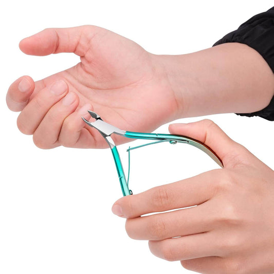 Jovyx PrecisionTrim – Cuticula Trimmer in use for neat nail care with sharp stainless steel design.